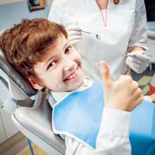 Little Boy Smiling in the Dental Clinic